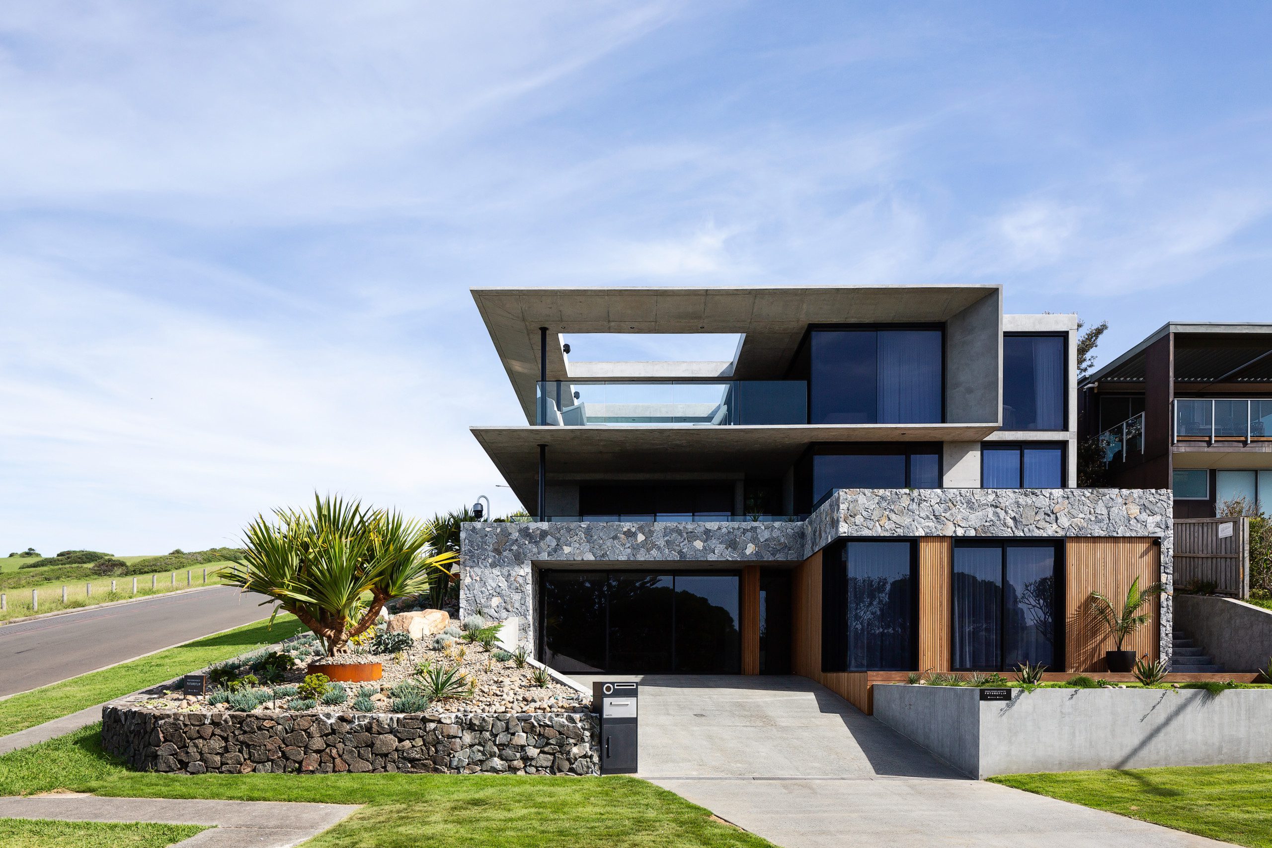 Contemporary, concrete showstopper by the beach