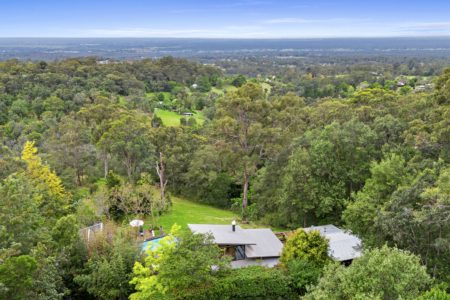 Award-Winning Architectural Retreat-Style Masterpiece with 25m Pool and Sydney Skyline Views